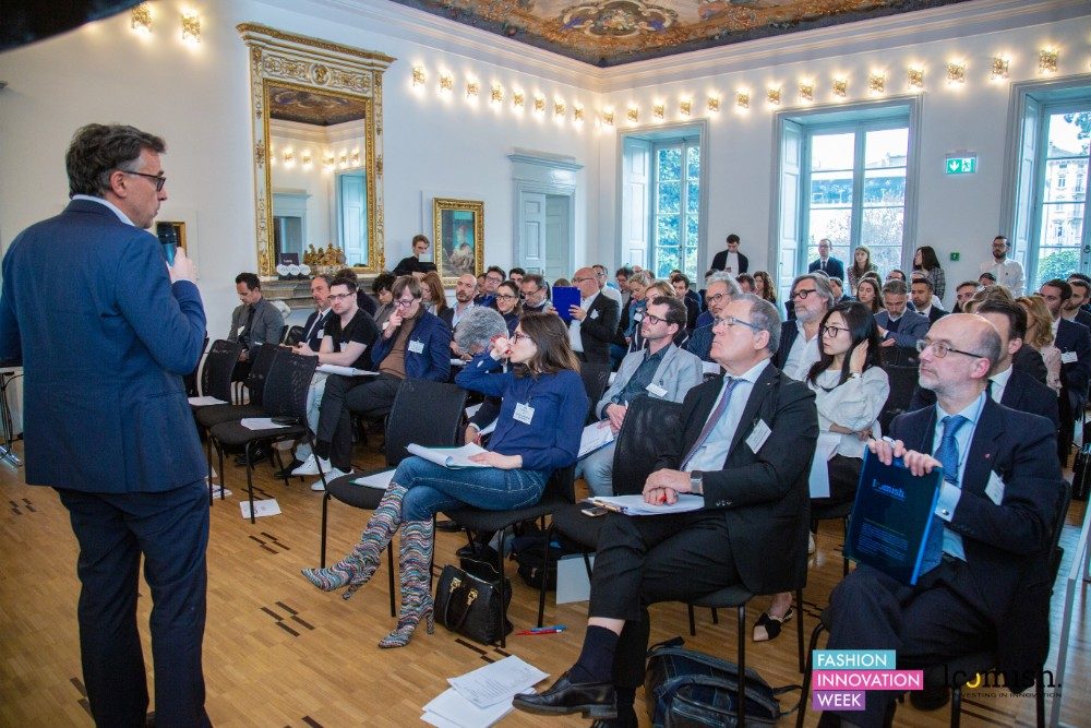 Finalists pitching to the jury and audience at the Fashion Innovation Award